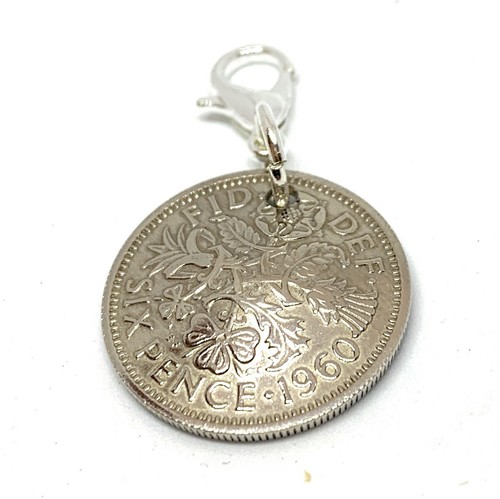 1957 69th lucky sixpence - lucky, domed