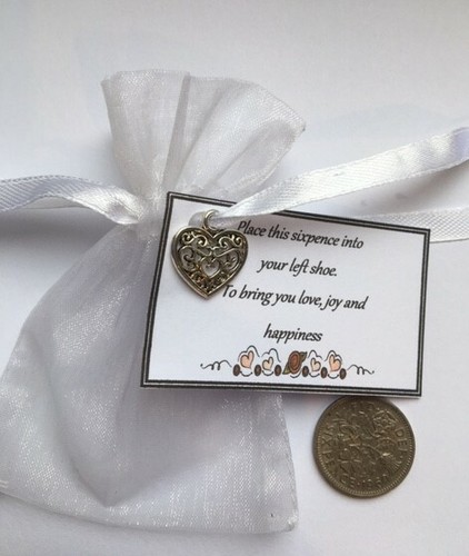 Lucky silver sixpence with - sixpence,